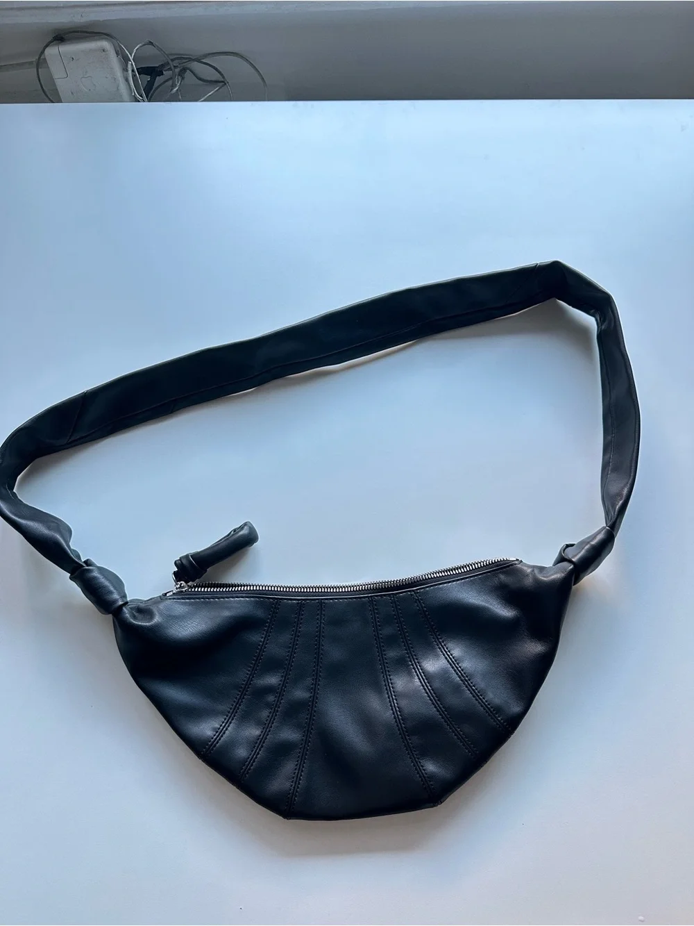 Black croissant bag